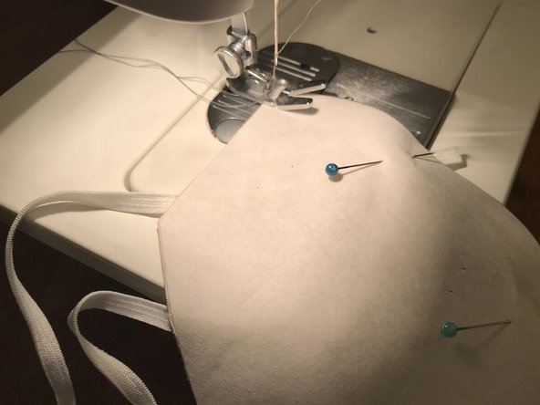 Starting at one corner, sew along the entire length of the curved edge.