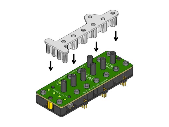 Locate the white plastic Assembly Cap part.
