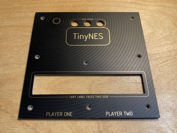 Place the replacement RGB top panel on top of the enclosure.