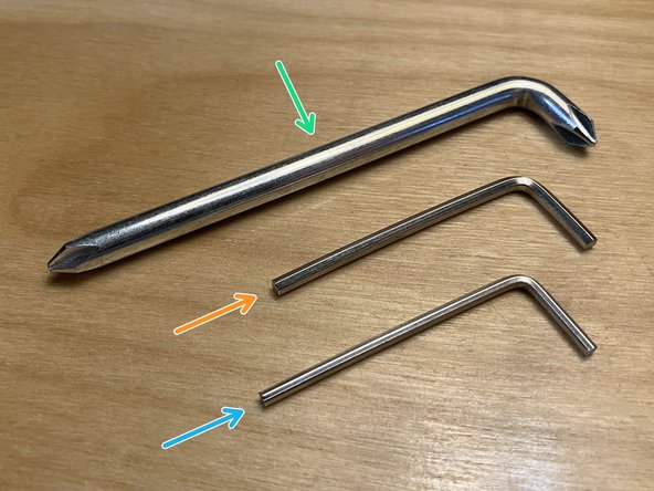 Locate the three screwdrivers from the included parts bag: