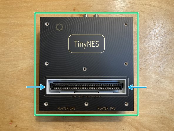 Place the top panel back on top of the enclosure.