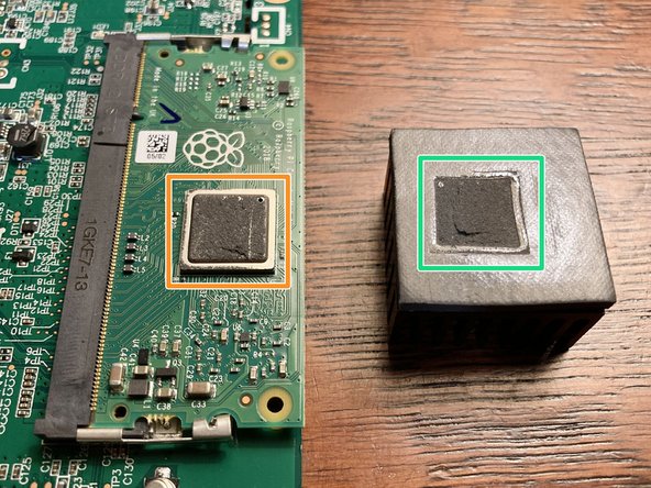 Place the heatsink on your work surface with the thermal pad facing up. You should see an indentation in the pad from the outline of the chip.