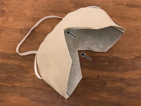 Carefully turn the mask inside out. The stiffness of the interface material might make this a little difficult. Go slowly.