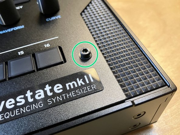 Gently thread the screws into place with your fingers, being careful not to cross-thread them or insert them at an angle.