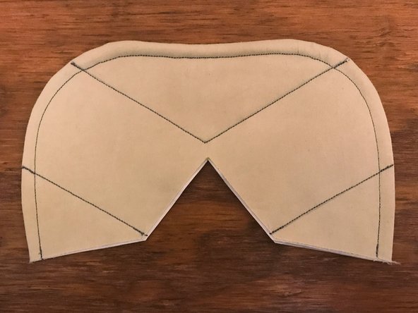 The two upper lines can be sewn in one continuous operation. When you get to the center point, make sure that the needle is down, lift up the presser foot, rotate the mask around the needle, then put the foot back down before continuing to sew.