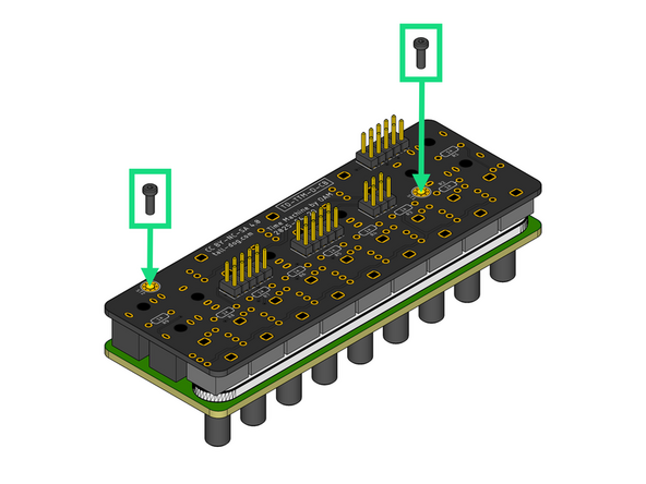 Grip the pair of boards and flip them over while applying slight pressure, holding them together so that none of the components become unseated.
