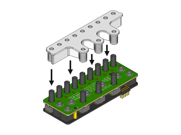 Locate the white plastic Assembly Cap part.