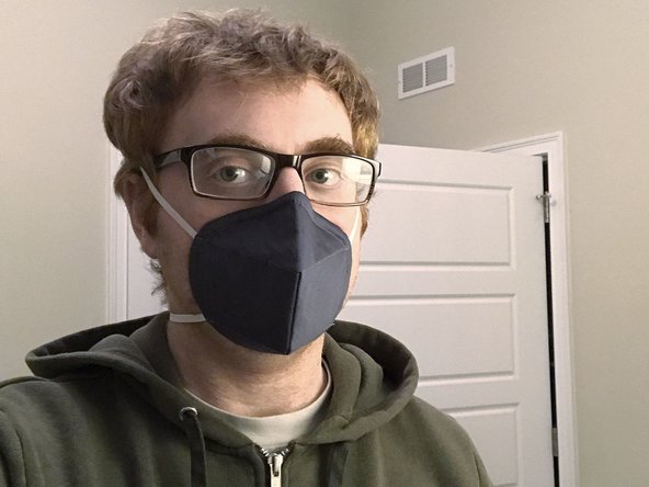 When wearing a mask like this, it should fit snugly around your nose and mouth.