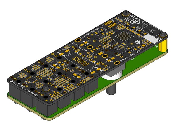 Locate and fasten three M2 × 6 mm pan head machine screws to secure the Assembly Template to the Main Board, sandwiching all of the loose components and the Assembly Spacer solidly between them.