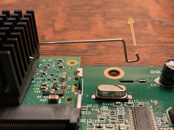 One side of the clip (highlighted here in orange) is simpler. This end is designed to be removed first.