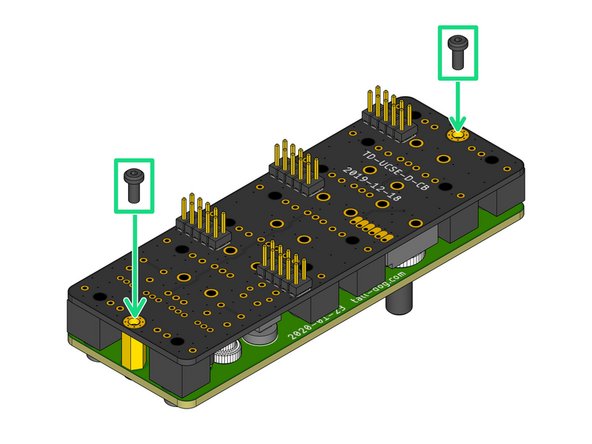 Grip the pair of boards and flip them over while applying slight pressure, holding them together so that none of the components become unseated.