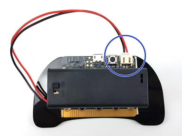 Finally, plug the battery pack cable into the micro:bit - the controller is now complete!