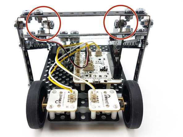 You will need 2 hinges to fix the flipper to the frame - you can use two silver brackets together like in the picture to make them.