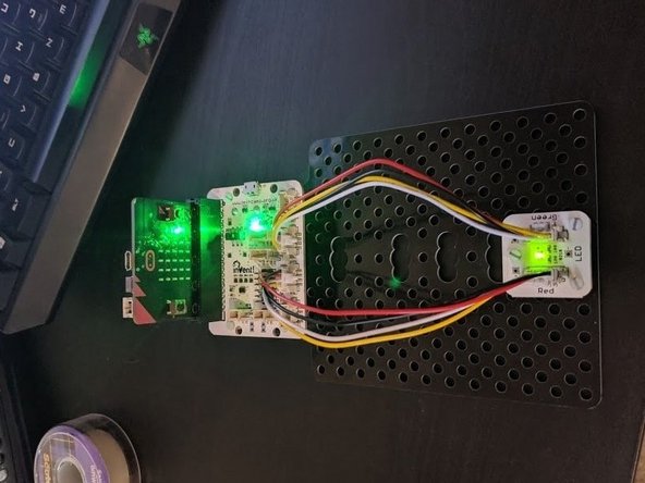 Remove any motors and the trackball on the board.