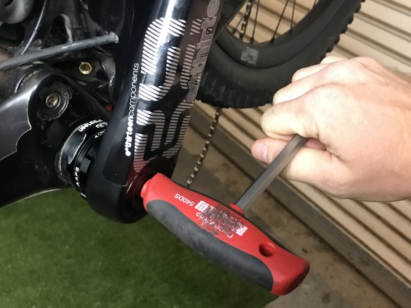 Install the non-drive side crank arm.