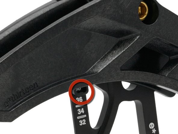 Reinstall the guide’s upper slider