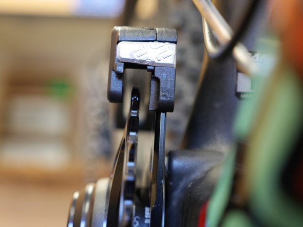 Sight down the front of the guide to check if the guide is centered over the chain ring