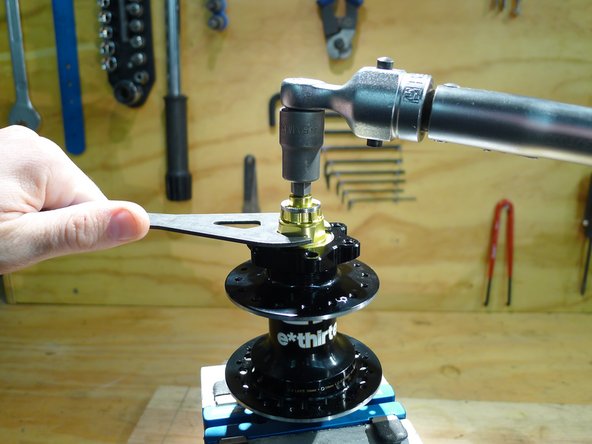 When you are happy with the adjustment, hold the preload ring with a cone wrench and tighten the non-drive endcap to 6nm