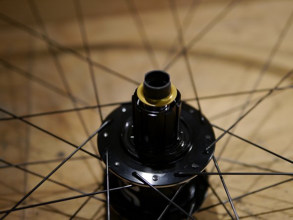 Slide the steel axle out of the drive side of the hub