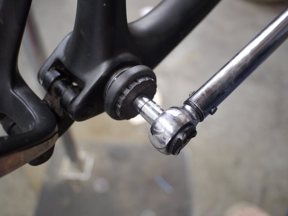 Using the e*thirteen BB tool in conjunction with a 10mm hex bit (if using an older version tool as shown) or if using a newer tool with the large hole in the middle a 16 lobe / 44mm OD socket (such as the Park BBT-19) and torque wrench, tighten the BB cup to 34-41nm