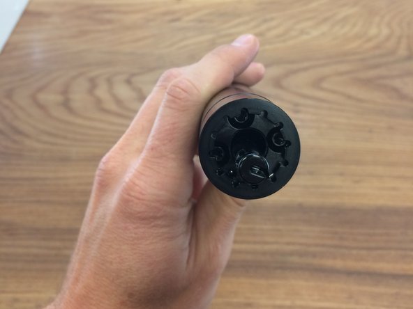 Next, remove the bottom cap of the post using a Park Tool FR5 or other Shimano compatible cassette tool. Turn counter-clockwise to loosen