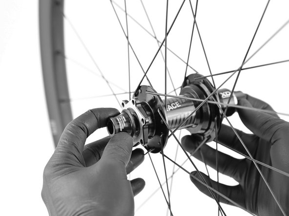 To remove axle pull non-drive endcap away from the hub while turning counter-clockwise.