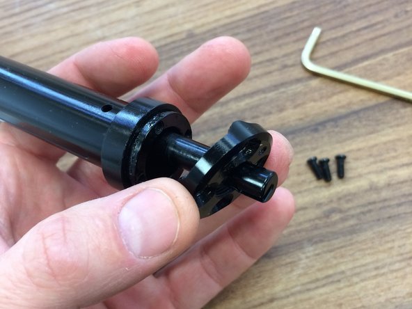 Install the cap, be sure to line the ball up with the hole in the cap