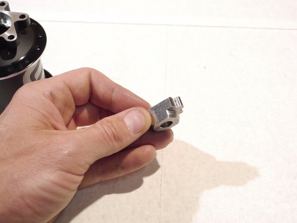 insert the bearing removal tool into the hub from the disc side and insert it into the drive side bearing