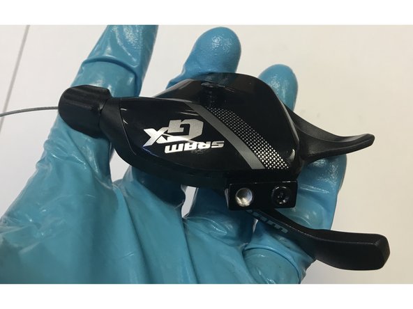 When shifting back down into the relaxed position for the ratchet, it may be necessary to gently pull the shifter cable while clicking the paddle. This mimics the tension provided by the derailleur spring and is normal.