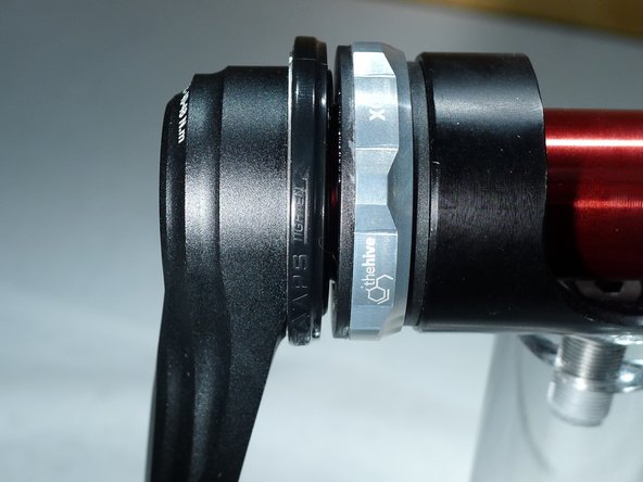 note how the inner portion of the adjuster moves and closes the gap between the adjuster and the bearing