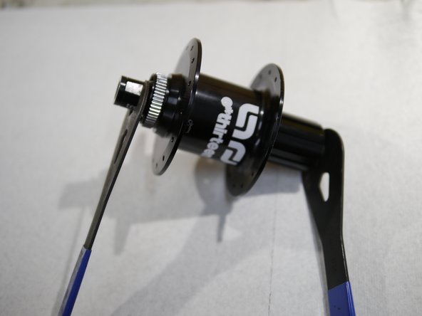 Tighten the endcap using cone wrenches by turning clockwise