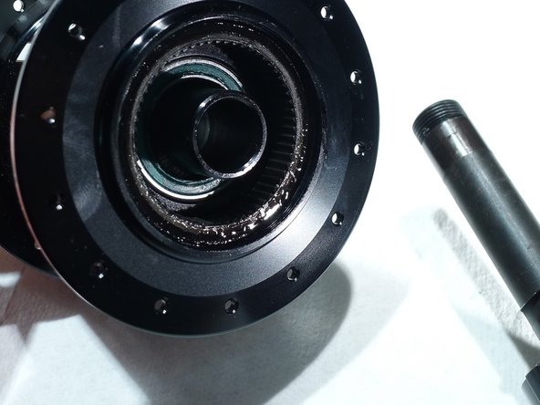 Be careful not to lose the pawls as they may fall while removing the freehub body