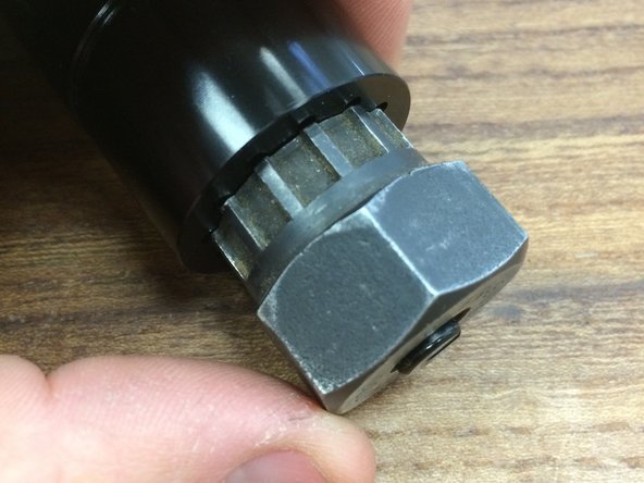 Clamp the seatpost in softjaws or use a strap wench to hold the post