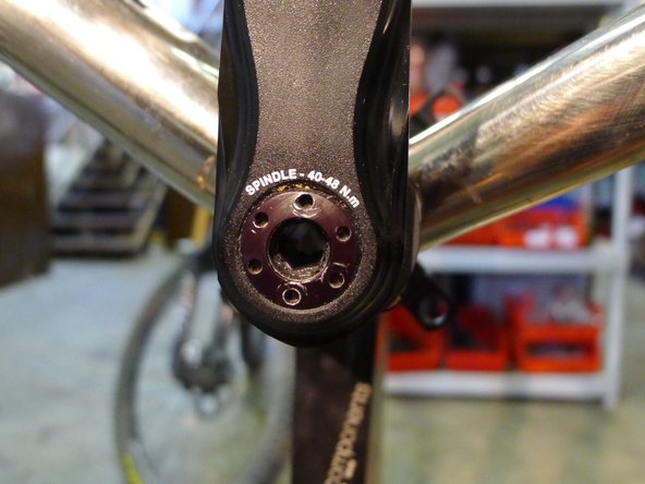To remove cranks using a self extractor cap, simply turn the 8mm hex screw counter clockwise. This will loosen the bolt, then remove the arm