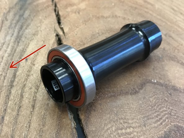 Remove bearing from axle sleeve