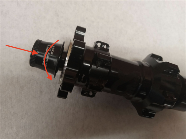 Install non-drive axle endcap. Apply pressure and tighten clockwise until endcap spins freely.