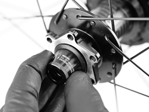 Install non-drive axle endcap. Apply pressure and tighten clockwise until endcap spins freely.