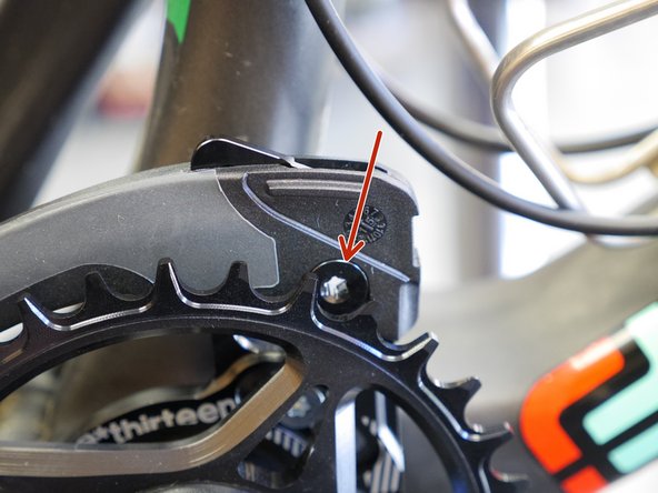 Adjust the upper slider height for your chainring size by loosening the T25 Torx bolt and sliding up or down on the backplate