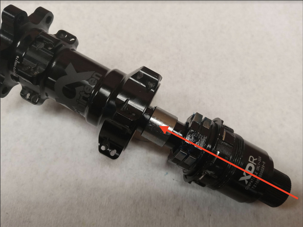 Slide the freehub and freehub sleeve onto the axle, and install in the hubshell.