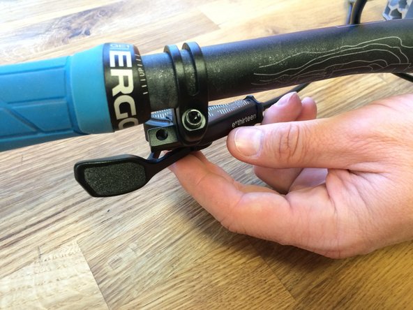 With the lever installed on the bike, adjust the paddle position to your preference and tighten the screw to 1N*m