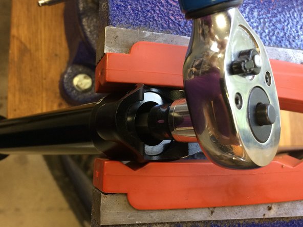 The main spring is located under this screw, so caution must me used when removing or tightening the screw