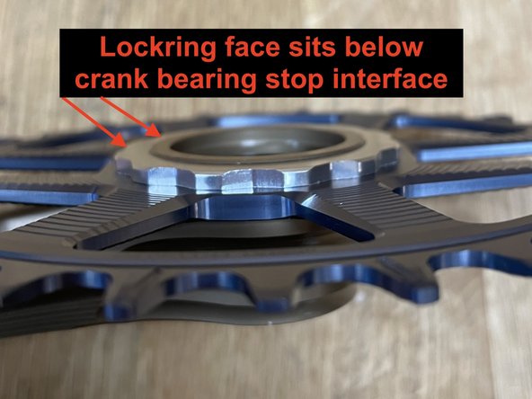 Ensure that the lockring is sitting below the cranks flange that interfaces with the BB.