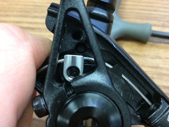 Slide the cable into the clamp