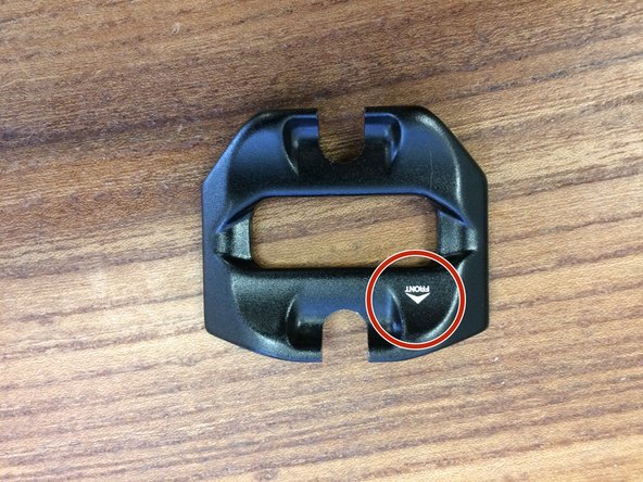 Lightly grease the clamp screws and install the saddle cradle using a T25 Torx driver