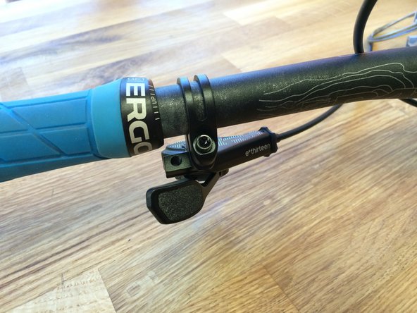 With the lever installed on the bike, adjust the paddle position to your preference and tighten the screw to 1N*m