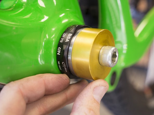 Using a BB30 bearing press, press the bearing into the cup