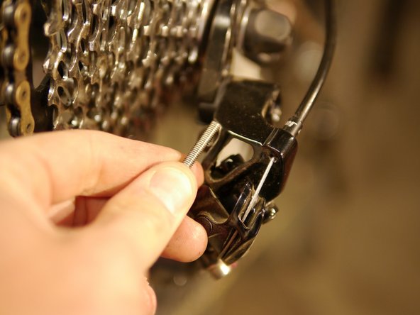 Be careful not to cross thread the new screw