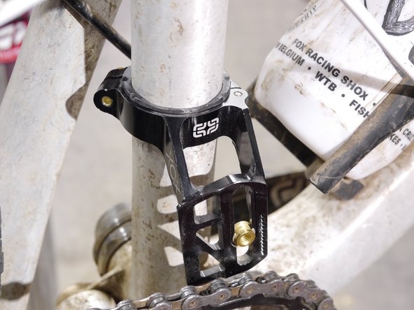 Be sure the slider is in line with the chainring (line up the seams on the slider with the ring)