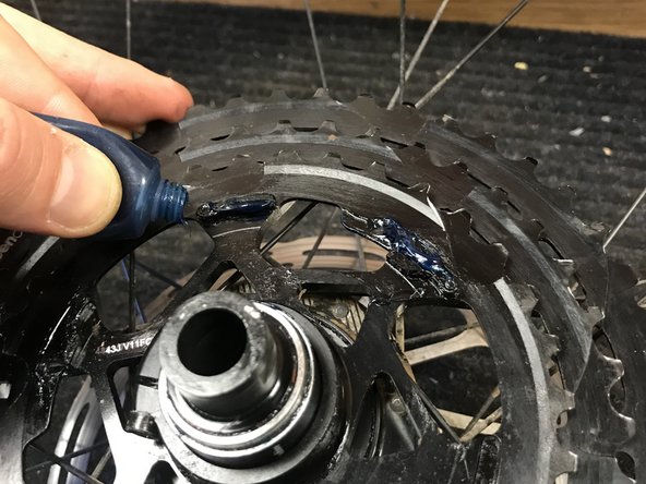 Lightly grease the connecting prongs on the aluminum carrier.