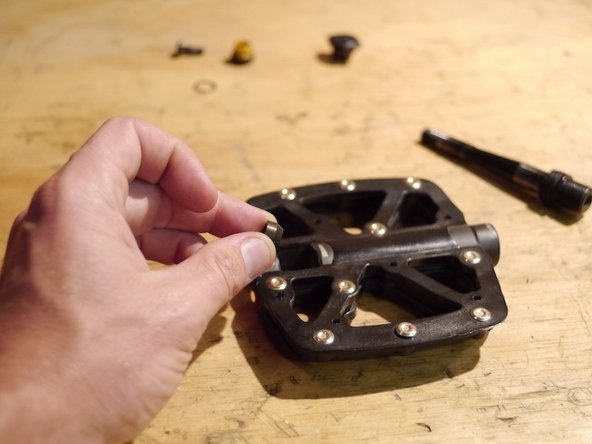 Install the pre-load wedge and slide down onto the axle flats